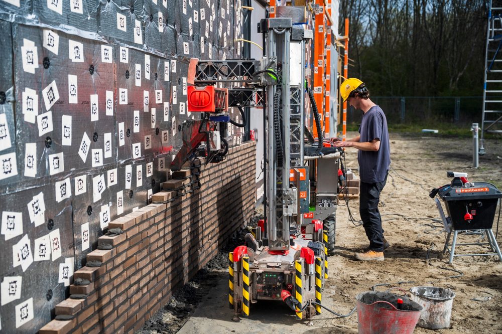 Monumental bricklaying robot fleet